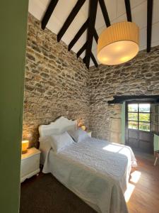 Cama o camas de una habitación en La Casona de Suesa