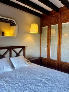 Cama o camas de una habitación en La Casona de Suesa