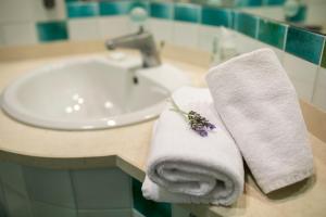 Koupelna v ubytování Hotel Carlo Felice Sassari
