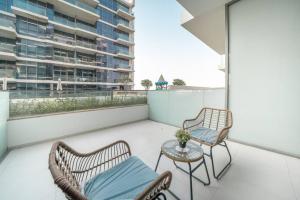 Balkón nebo terasa v ubytování StoneTree - Furnished Studio in Golf Promenade 3A