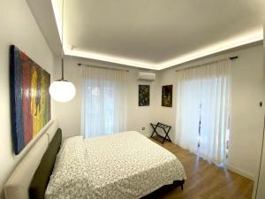 Scarlatti 67 Apartment tesisinde bir odada yatak veya yataklar