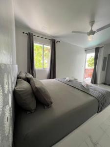 Postel nebo postele na pokoji v ubytování Empyrean Stay, Maldives