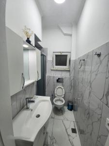 Koupelna v ubytování Taxim No1 Suites