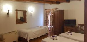 TV a/nebo společenská místnost v ubytování Hotel Rincón Castellano