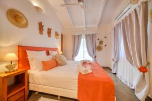 Postel nebo postele na pokoji v ubytování Villa Kap Corail