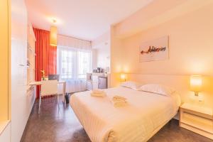 Residence Montempo Lyon Cite Internationale客房内的一张或多张床位