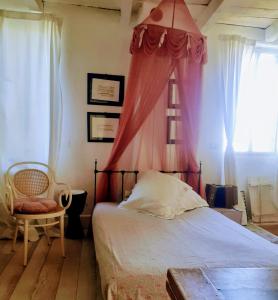 Cama o camas de una habitación en B&B Casa della Musica