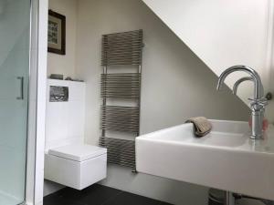 Koupelna v ubytování Loft met veel zonlicht