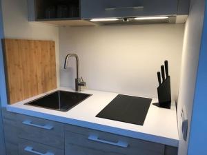 Kuchyň nebo kuchyňský kout v ubytování Loft met veel zonlicht