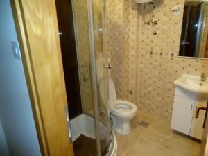 Ванная комната в Apartment Vukanic +37 фотографий