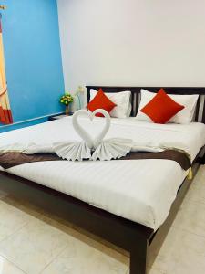 Postel nebo postele na pokoji v ubytování Lanta Grand House