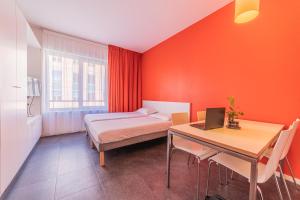 Residence Montempo Lyon Cite Internationale客房内的一张或多张床位
