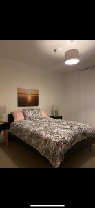 a bedroom with a large bed in a room at Luxurious suite apartment Scotland in Edinburgh