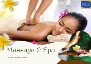 a woman getting a massage at a spa at Hotel Xaine Park in Lloret de Mar