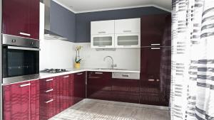 Kuchyň nebo kuchyňský kout v ubytování Apartment L&A