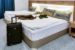 Postel nebo postele na pokoji v ubytování PARK YALÇIN HOTEL