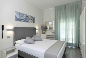 Cama o camas de una habitación en Hotel Doge