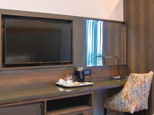 TV a/nebo společenská místnost v ubytování MGB Hotel at 2ten