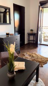 a living room with a couch and a table at DREAM HOUSE Lis in Lis