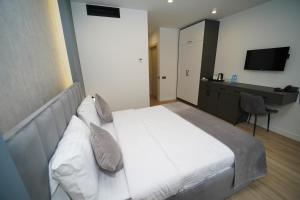Voodi või voodid majutusasutuse B&M Hotel toas