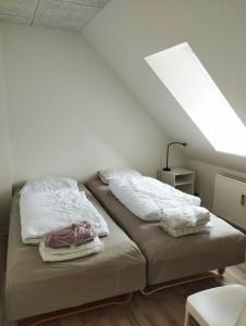 Una cama o camas en una habitación de Østergade 87. 1 th (id.026)