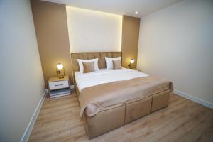 Voodi või voodid majutusasutuse B&M Hotel toas