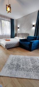 A bed or beds in a room at Sumski san 5