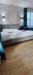 A bed or beds in a room at Sumski san 5