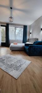 A bed or beds in a room at Sumski san 5