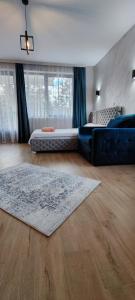 A bed or beds in a room at Sumski san 5