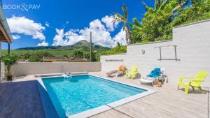 สระว่ายน้ำที่อยู่ใกล้ ๆ หรือใน Alpinia - Appt avec piscine partagée