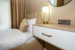 Voodi või voodid majutusasutuse B&M Hotel toas