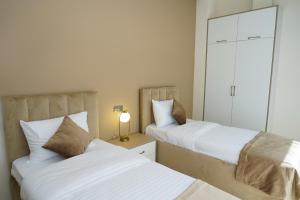 Voodi või voodid majutusasutuse B&M Hotel toas