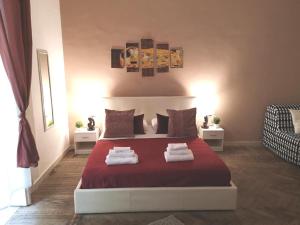 Letto o letti in una camera di DOMUS LUIGI LEONE 2