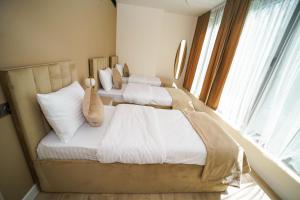 Voodi või voodid majutusasutuse B&M Hotel toas
