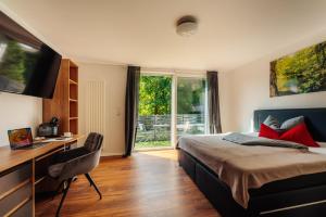 TV a/nebo společenská místnost v ubytování Hotel Hafermarkt