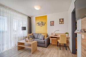TV a/nebo společenská místnost v ubytování Hotel Wiehen-Therme