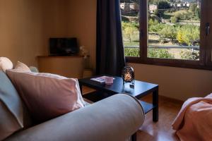 Sjónvarps- og/eða afþreyingartæki á Apartaments Sant Bernat