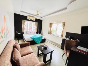 TV a/nebo společenská místnost v ubytování BluO Lake View NewTown - Boutique Hotel