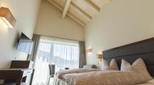 Postel nebo postele na pokoji v ubytování Hotel Niederreiter