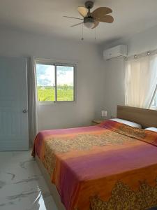 เตียงในห้องที่ Incantevole Family Apart. Residencial Sol Caribe