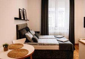 Posteľ alebo postele v izbe v ubytovaní Memory Apartments