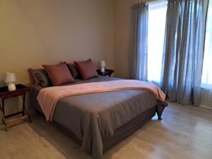 Un pat sau paturi într-o cameră la Cul-de-Stay Self-catering accommodation