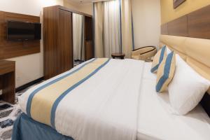 Voodi või voodid majutusasutuse Ehdaa Hotel toas