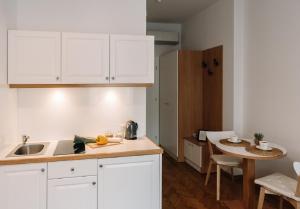 Kitchen o kitchenette sa Memory Apartments
