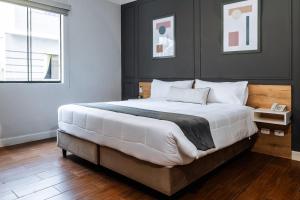 Cama ou camas em um quarto em TARATA BOUTIQUE HOTEL