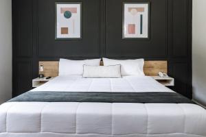 Cama ou camas em um quarto em TARATA BOUTIQUE HOTEL
