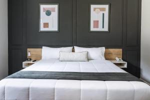 Cama ou camas em um quarto em TARATA BOUTIQUE HOTEL