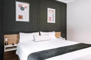 Cama ou camas em um quarto em TARATA BOUTIQUE HOTEL
