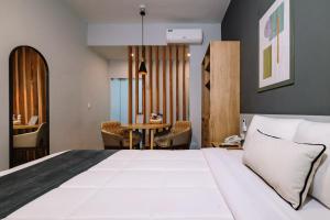 Cama ou camas em um quarto em TARATA BOUTIQUE HOTEL
